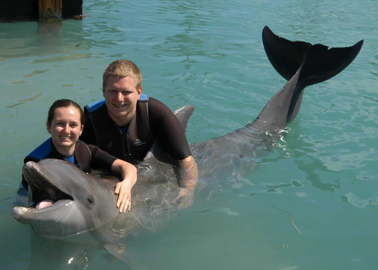 Hugging a dolphin