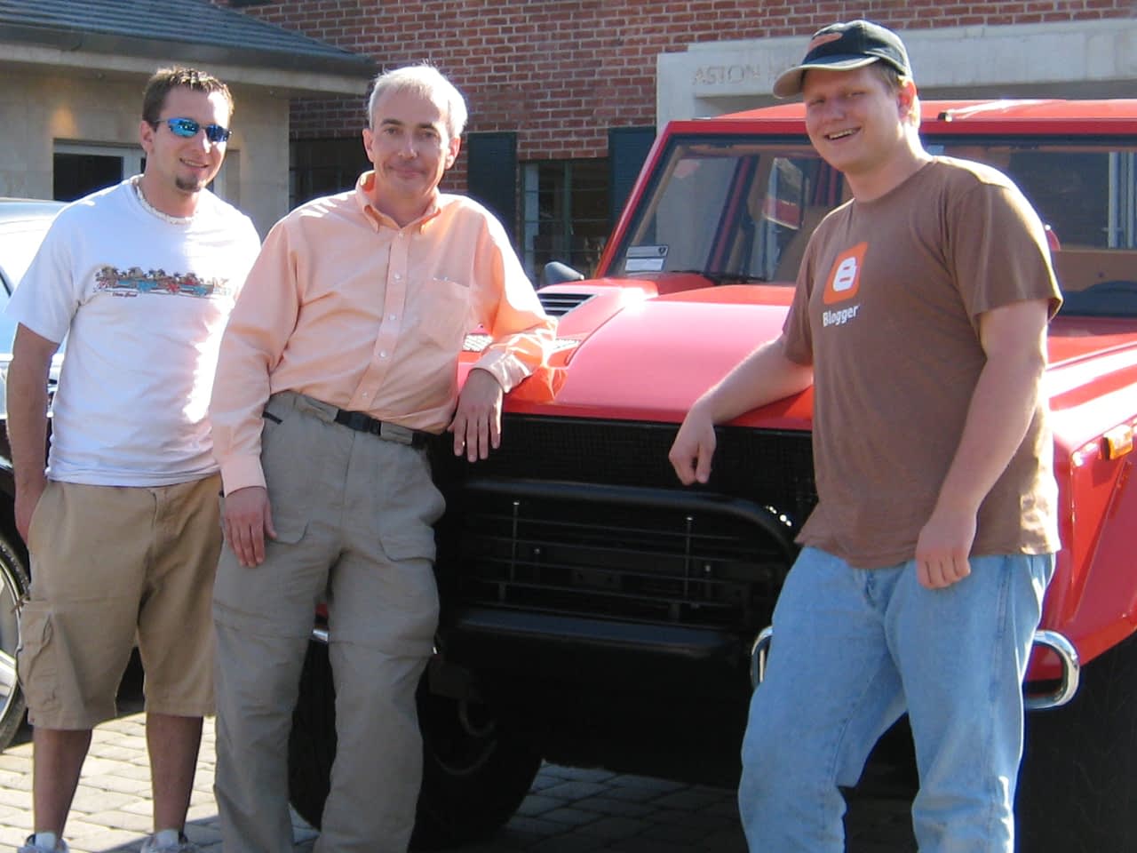 Mike, Dr. Warner, and Patrick in front of Lamborghini LM002